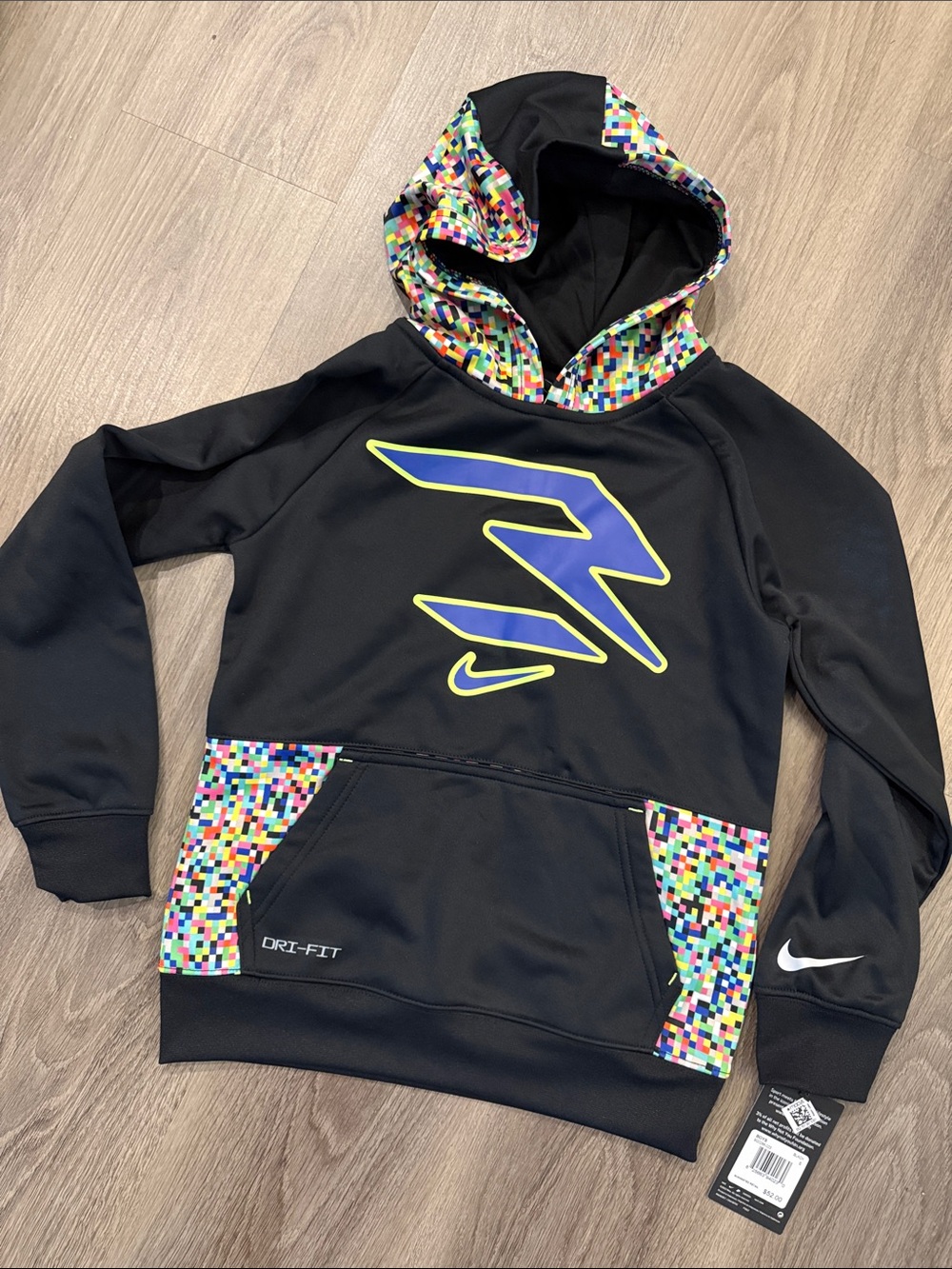 Nike Black Kids Hoodie with Neon Blue & Multicolor Pixel Accents